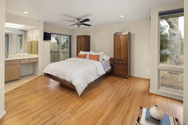 bedroom featuring recessed lighting, ceiling fan, access to outside, and light wood-style floors