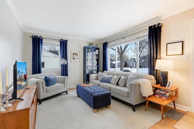 living room featuring hardwood / wood-style flooring and ornamental molding