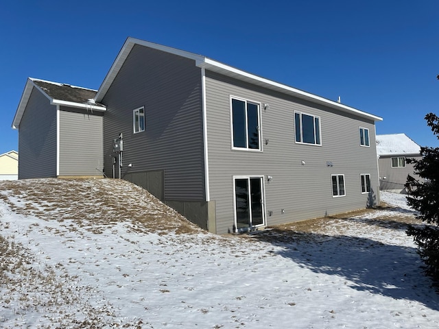 view of snow covered property