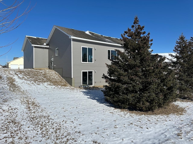 view of snow covered property