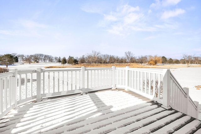 view of snow covered deck