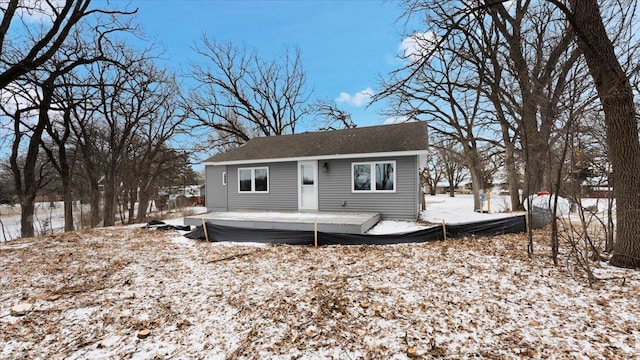 view of front of home with a deck