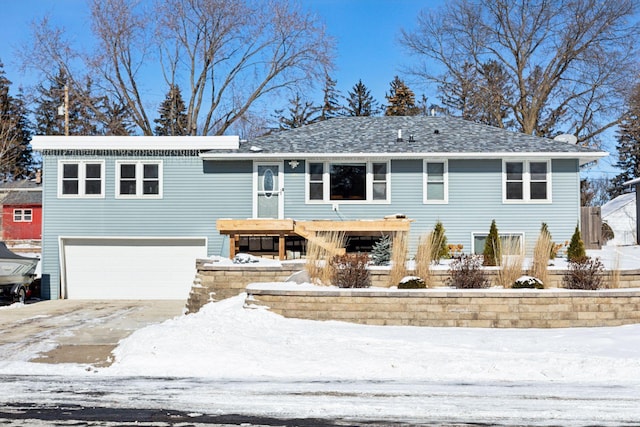 view of front of house with driveway and an attached garage