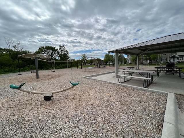 view of property's community featuring playground community and a gazebo