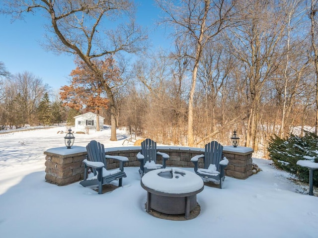 view of snow covered patio