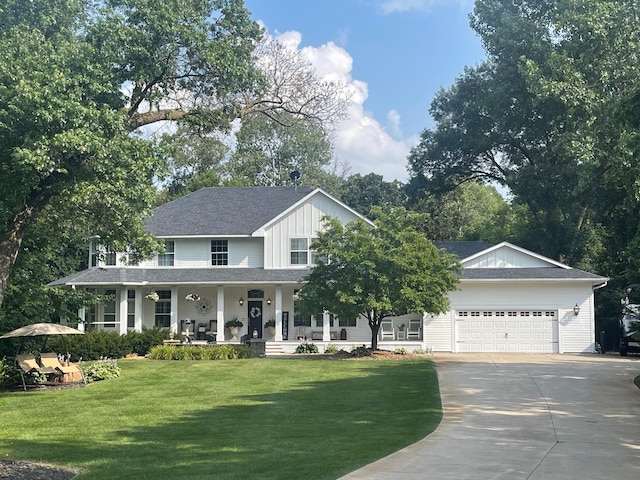 view of front of property with driveway, a garage, a shingled roof, covered porch, and a front yard