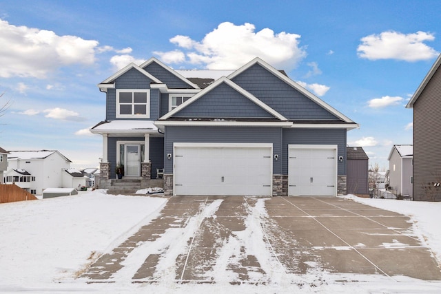 craftsman house with a garage