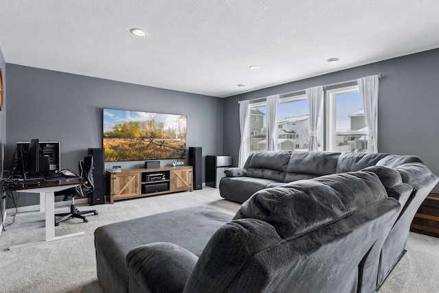 carpeted living room with a textured ceiling