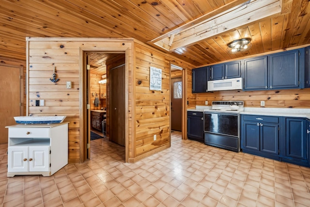 3313 Twin Island Cir NW, Prior Lake, MN 55372 - kitchen featuring range with electric stovetop, white microwave, blue cabinets, wooden walls, and light countertops