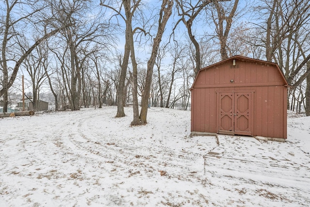 3313 Twin Island Cir NW, Prior Lake, MN 55372 - snow covered structure featuring a storage unit