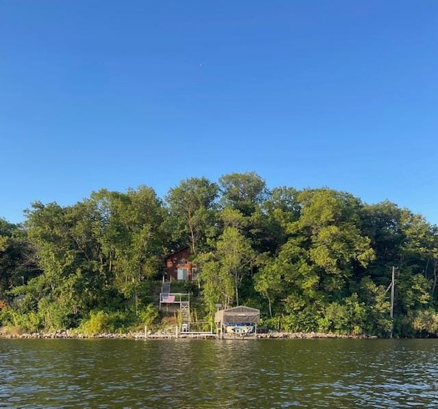 3313 Twin Island Cir NW, Prior Lake, MN 55372 - water view with a boat dock and a heavily wooded area
