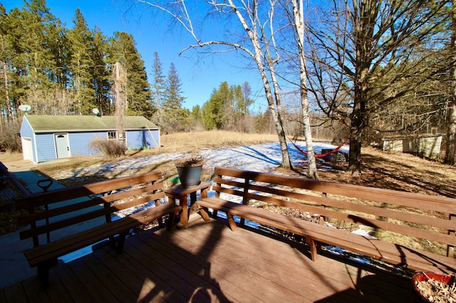 deck featuring an outbuilding