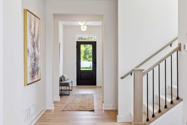 foyer entrance featuring light hardwood / wood-style floors