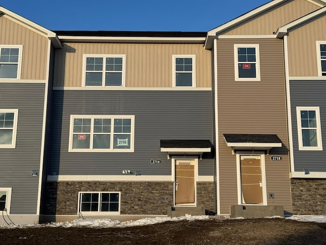 view of front of home featuring stone siding