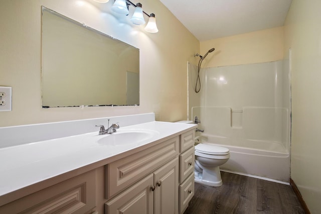 full bathroom with toilet, vanity, tub / shower combination, and wood-type flooring