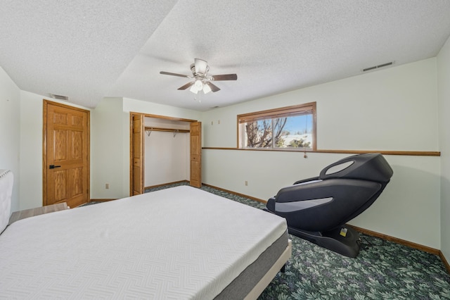 bedroom featuring a ceiling fan, baseboards, visible vents, and a closet