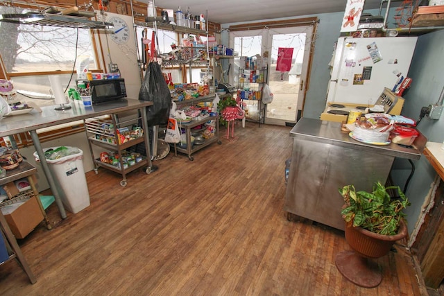 miscellaneous room featuring wood finished floors