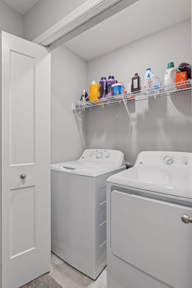 laundry room with laundry area and separate washer and dryer