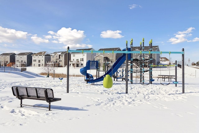 snow covered playground featuring playground community