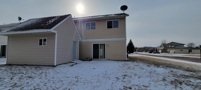 view of snow covered property