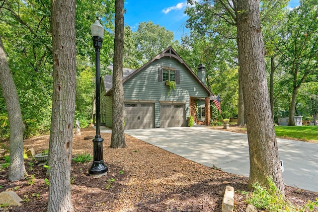 view of property exterior featuring a garage