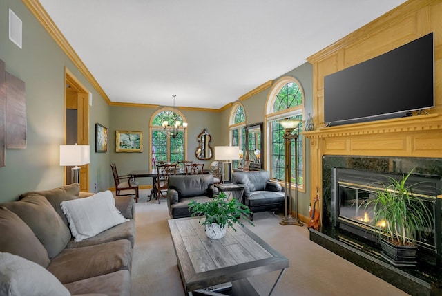 living room featuring crown molding, a healthy amount of sunlight, and carpet