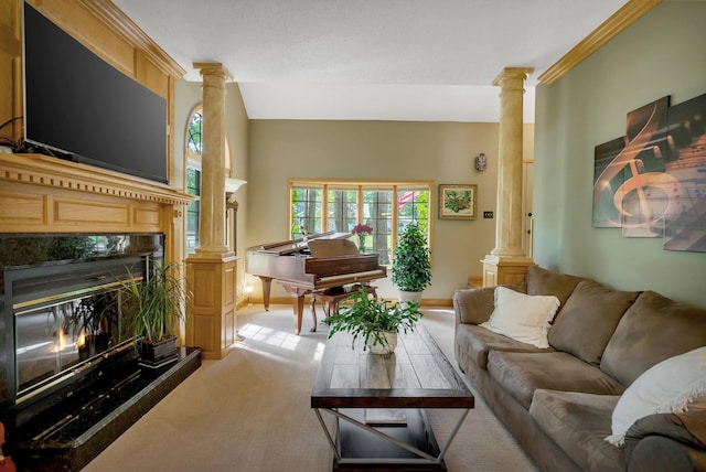 carpeted living room with decorative columns and a premium fireplace