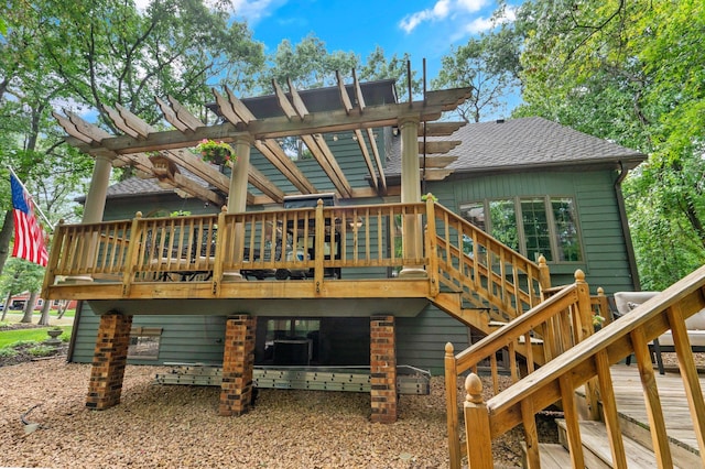 rear view of house with a deck