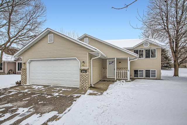 view of front of home with a garage