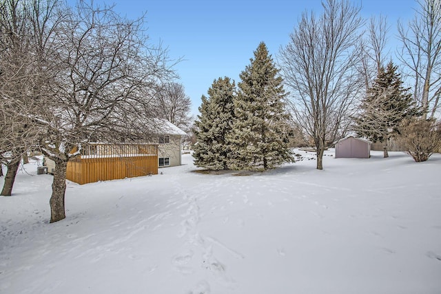 view of yard covered in snow