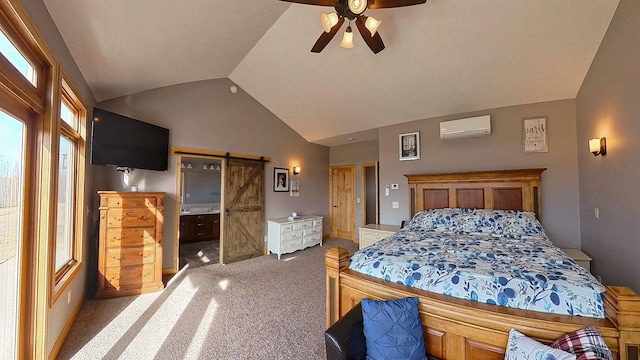 carpeted bedroom featuring a barn door, multiple windows, an AC wall unit, and vaulted ceiling