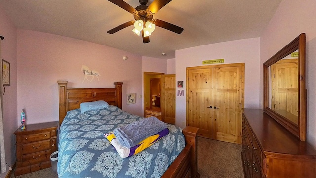 bedroom with a closet, ceiling fan, and carpet floors