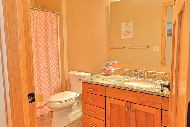 bathroom featuring vanity, tile patterned floors, toilet, and a shower with curtain