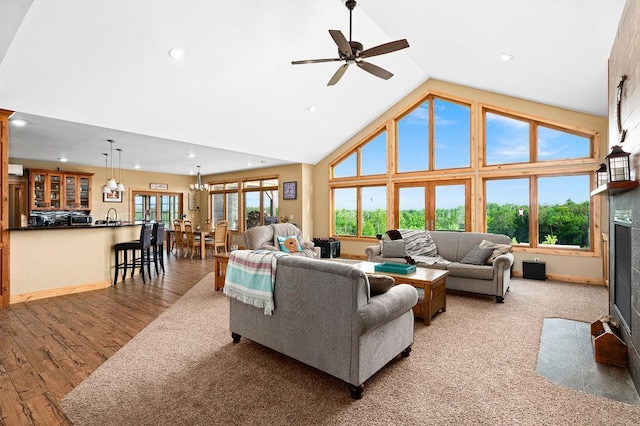 1036 Ziebarth Rd, Wrenshall, MN 55797 - living area featuring recessed lighting, high vaulted ceiling, a ceiling fan, and wood finished floors