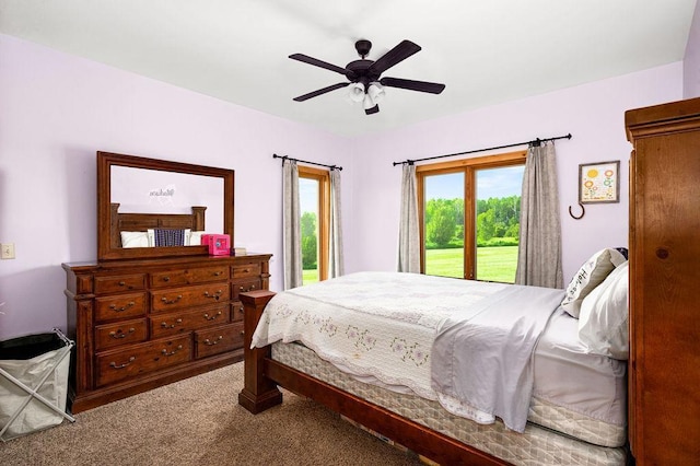 1036 Ziebarth Rd, Wrenshall, MN 55797 - carpeted bedroom featuring access to outside and ceiling fan