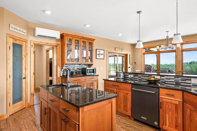 1036 Ziebarth Rd, Wrenshall, MN 55797 - kitchen featuring a wall mounted AC, dishwasher, stainless steel microwave, decorative backsplash, and a sink