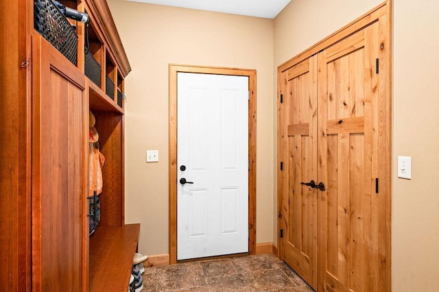 1036 Ziebarth Rd, Wrenshall, MN 55797 - mudroom featuring baseboards