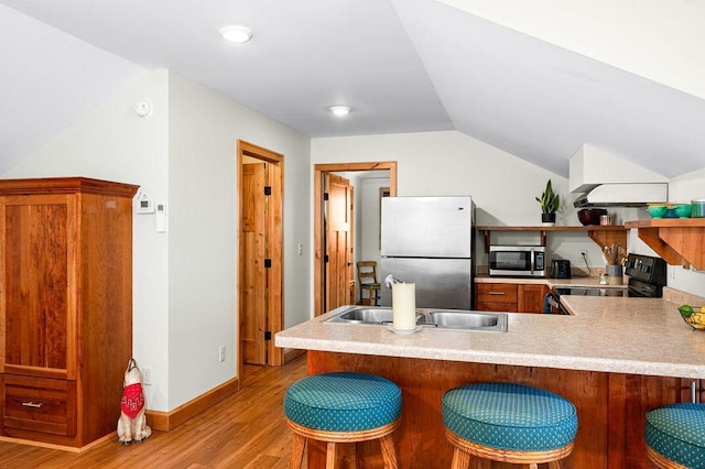 1036 Ziebarth Rd, Wrenshall, MN 55797 - kitchen featuring stainless steel appliances, open shelves, light wood-style flooring, a sink, and light countertops