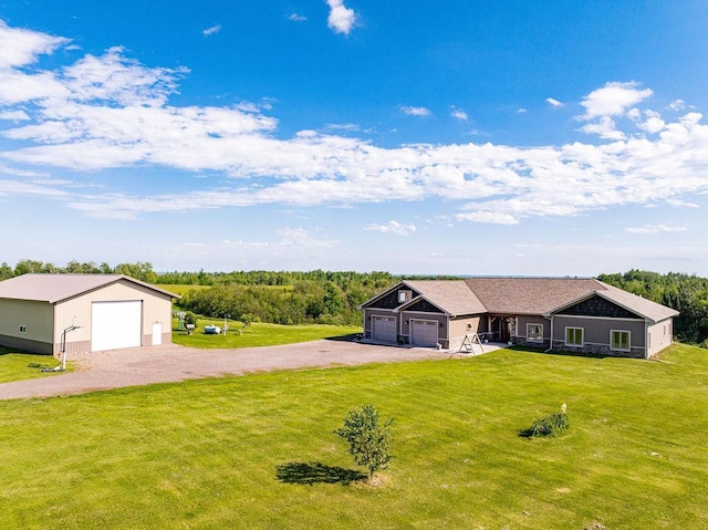 1036 Ziebarth Rd, Wrenshall, MN 55797 - single story home featuring a front lawn and a detached garage