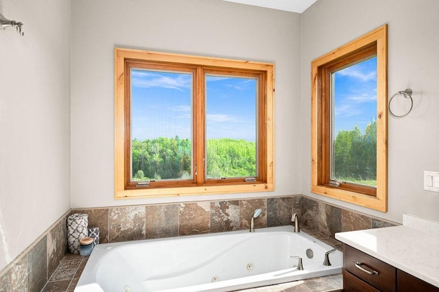 1036 Ziebarth Rd, Wrenshall, MN 55797 - full bath with plenty of natural light, a jetted tub, and vanity