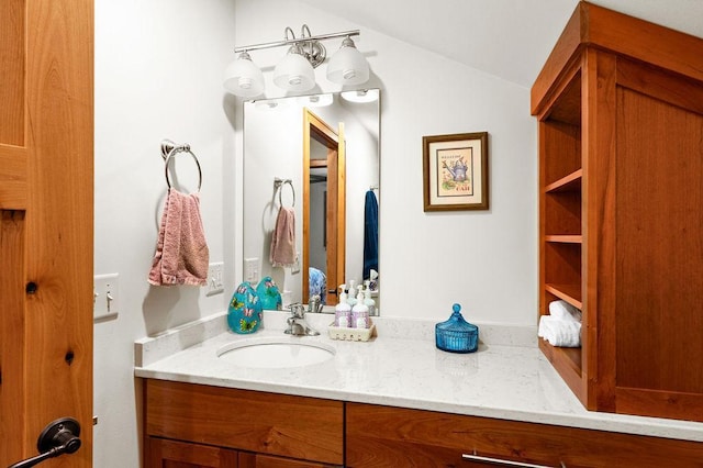 1036 Ziebarth Rd, Wrenshall, MN 55797 - bathroom featuring vanity and lofted ceiling