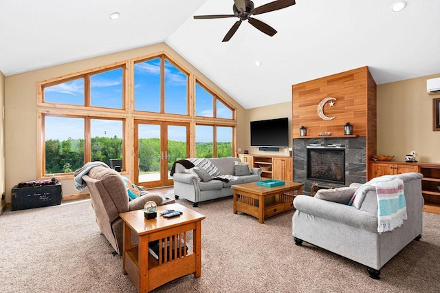 1036 Ziebarth Rd, Wrenshall, MN 55797 - living room with light colored carpet, a premium fireplace, a ceiling fan, recessed lighting, and high vaulted ceiling