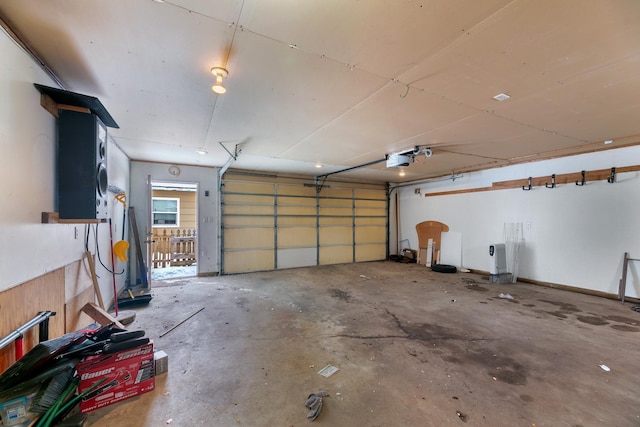 garage featuring a garage door opener