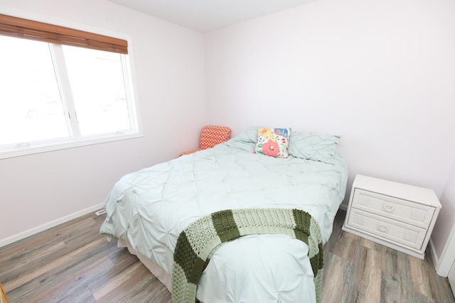 bedroom featuring hardwood / wood-style flooring
