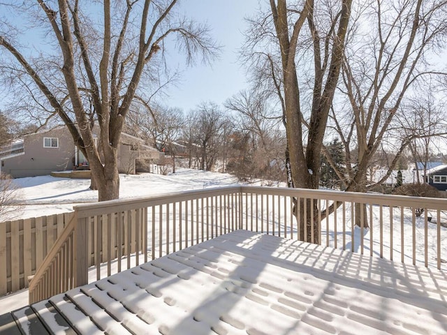 view of snow covered deck