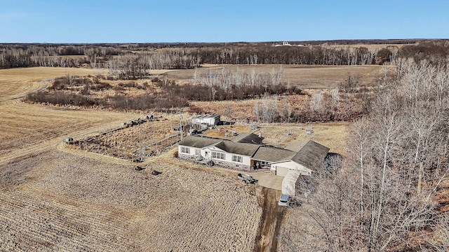 birds eye view of property featuring a rural view