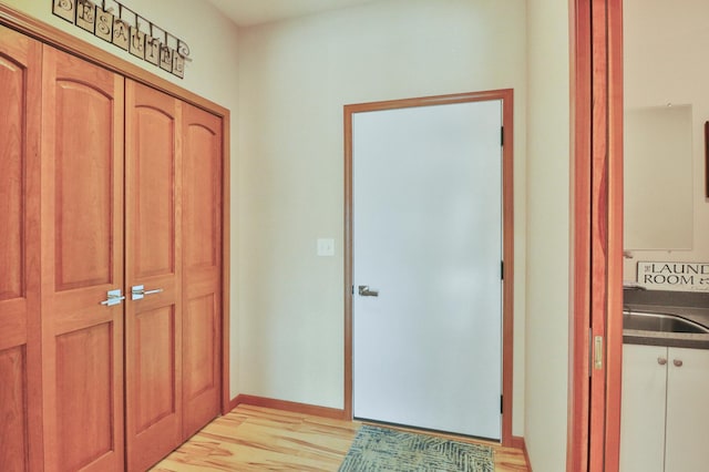 14453 County Highway 5, Lake Park, MN 56554 - foyer entrance featuring light wood-type flooring and baseboards