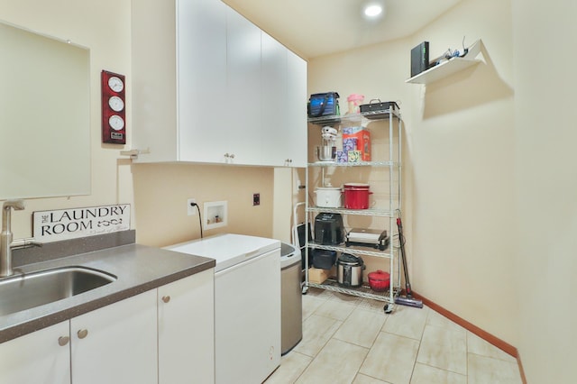 14453 County Highway 5, Lake Park, MN 56554 - laundry room featuring cabinet space, light tile patterned floors, and washer / dryer