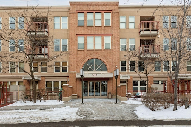 view of snow covered building