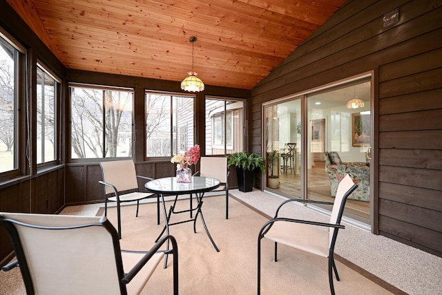 sunroom with wood ceiling and vaulted ceiling